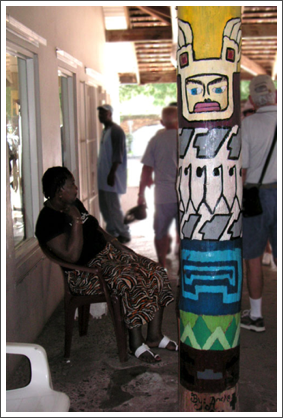 ST. JOHN'S–The Dockyard Market is supported by pillars painted in Antiguan themes by art students