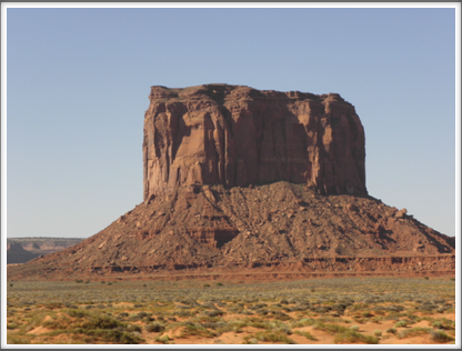 MONUMENT VALLEY: a flat-topped butte rising from the desert floor