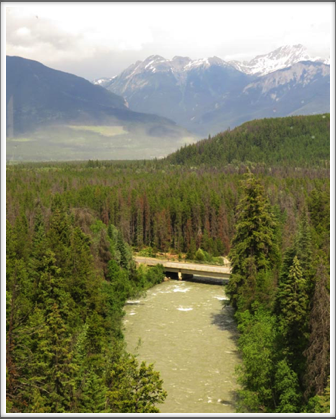 BRITISH COLUMBIA–a great view of a river and the upper Rocky Mountains