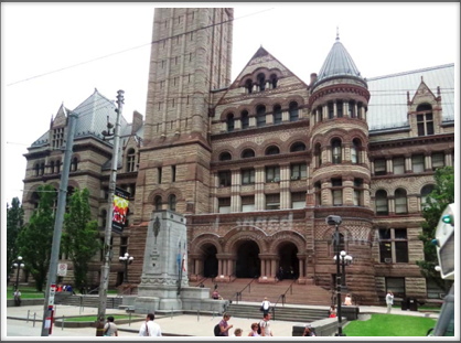 TORONTO–the Old City Hall, finished 1899, sports a two-tone sandstone construction