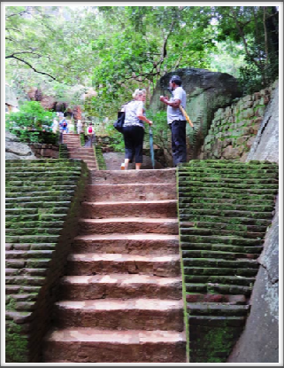 SIGIRIYA–moss-covered brick paths and stairs lead to the Lion Rock