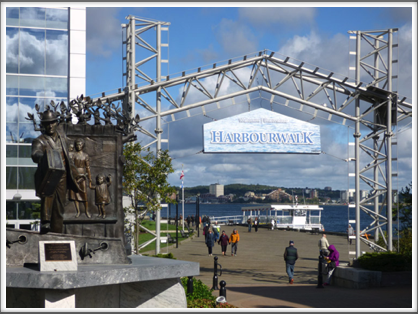 HALIFAX, NOVA SCOTIA—entrance to Harbourwalk with a sculpture honoring immigrants