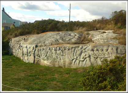 PEGGY'S COVE—this 30 ft carving in granite bedrock honors the Nova Scotian fishermen