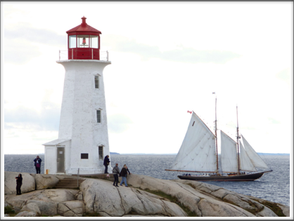 PEGGY'S COVE—the iconic shot of the lighthouse and passing sailboat